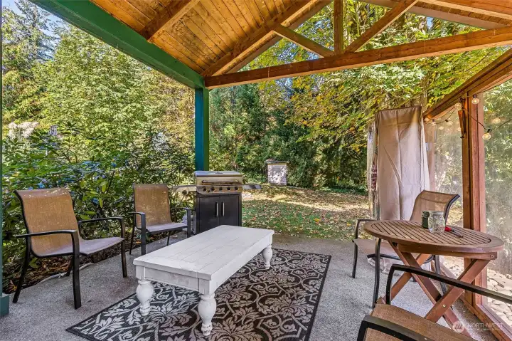BBQ year round in this quaint covered patio