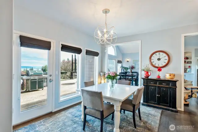 The eating area off the kitchen is a significant design element because it enhances the overall experience of dining, entertaining, and daily living.  When paired with thoughtful views and access to the deck outside, it transforms mealtime into a more enjoyable and connected experience meant to be social and engaging.