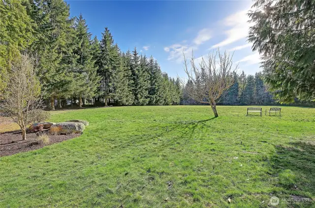 The Park.  It's here and ready for you as a homeowner. 5 acres. Then the trailhead in the SE corner to take you and maybe your furry family member on a 2 mile loop through a quiet, magical forest trail where owls, birds and wildlife habitat. That's pretty amazing...