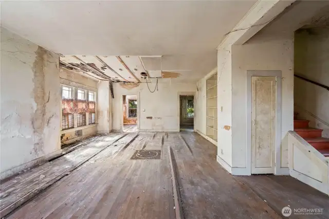 The home's original architecture is charming. Use caution walking on the buckled floors.