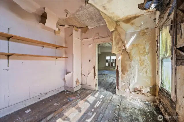 This is a bonus room off the main living area. It has been heavily damaged by water.