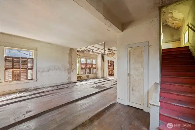 From the living room, the stairs to the upper level are shown here.