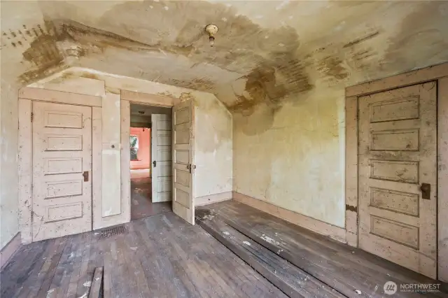The closet and entrance to the first bedroom.
