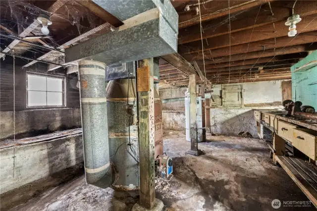 A different view of the unfinished basement.