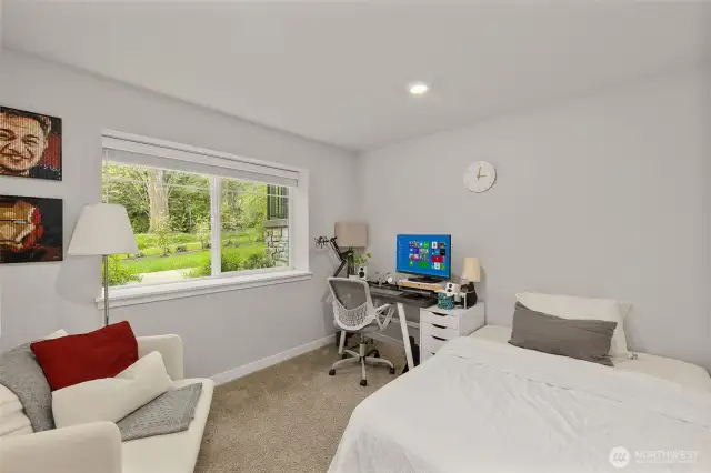 Lower level bdrm offers flexibility as a guest bdrm/media/gym/office to match your lifestyle & daily needs
