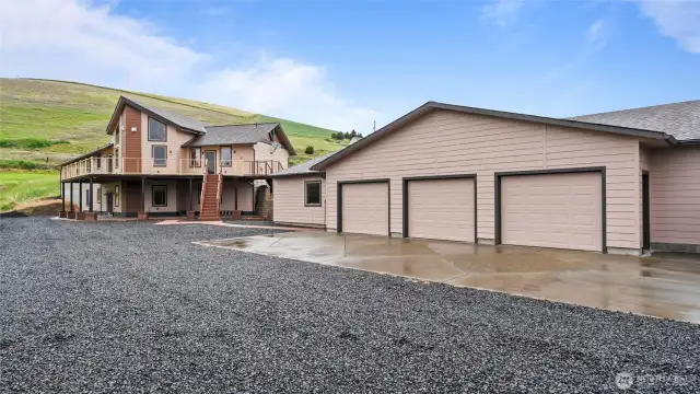 Shop/storage building with 3 bay garage or bring you ideas to this awesome building fully insulated with electricity