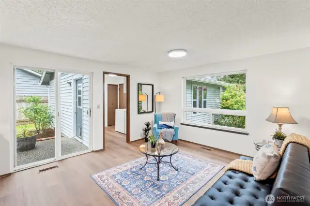 The slider from the family room also leads out to the patio and rose garden.