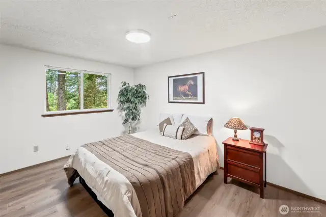 Bedroom #2 is on the front corner of the house with a west facing window.