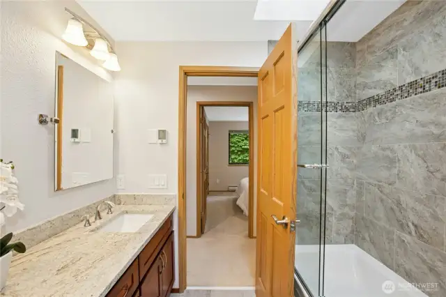 New shower/bath is a great addition to this updated bathroom!