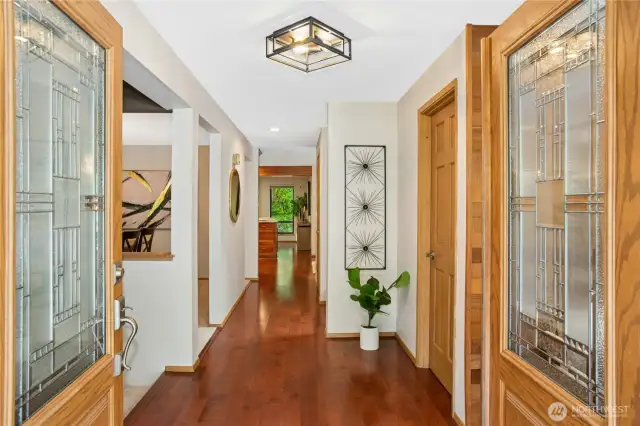 Gleaming hardwoods welcome you into the main entry