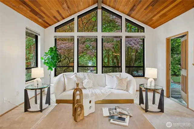 Exit the living room to your own private park-like yard and deck outside
