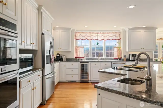 Granite countertops, second prep sink, stainless appliances  & Bev. cooler.