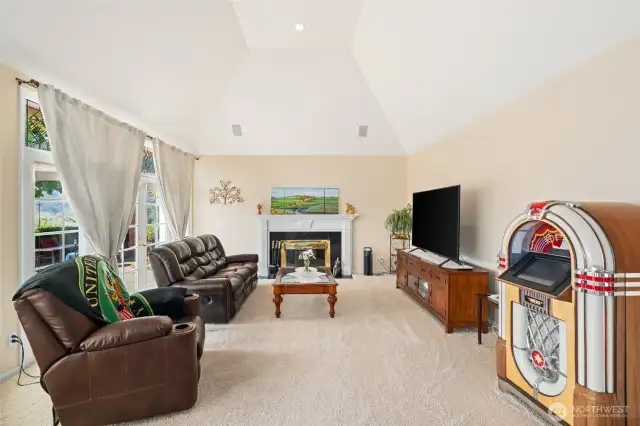 Family Room with french doors to patio and fireplace.