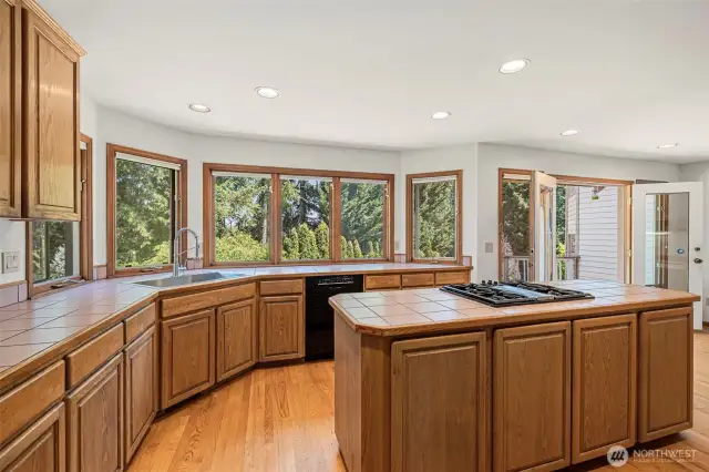 Spacious kitchen with island and hardwood floors