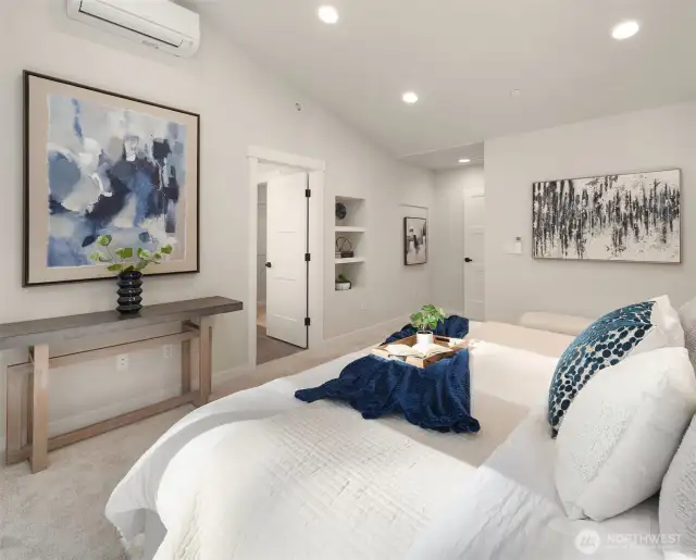 Primary suite with built in book shelf.