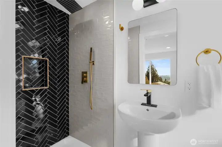 Walk in shower, custom tilework and gold trimmings