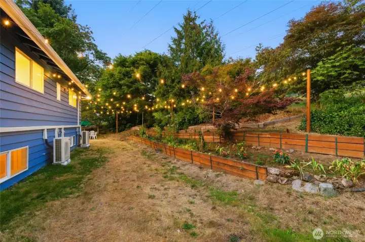 Back & large side yards with garden and lights
