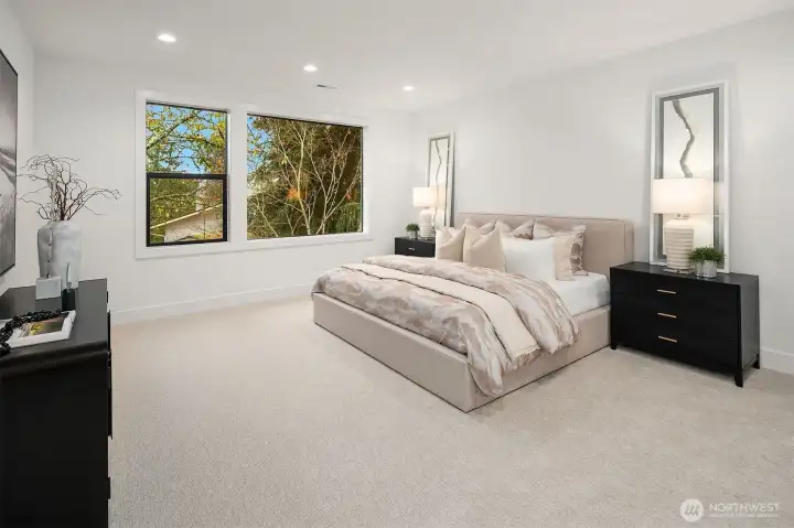 Designer primary suite with five-piece bath with heated floors