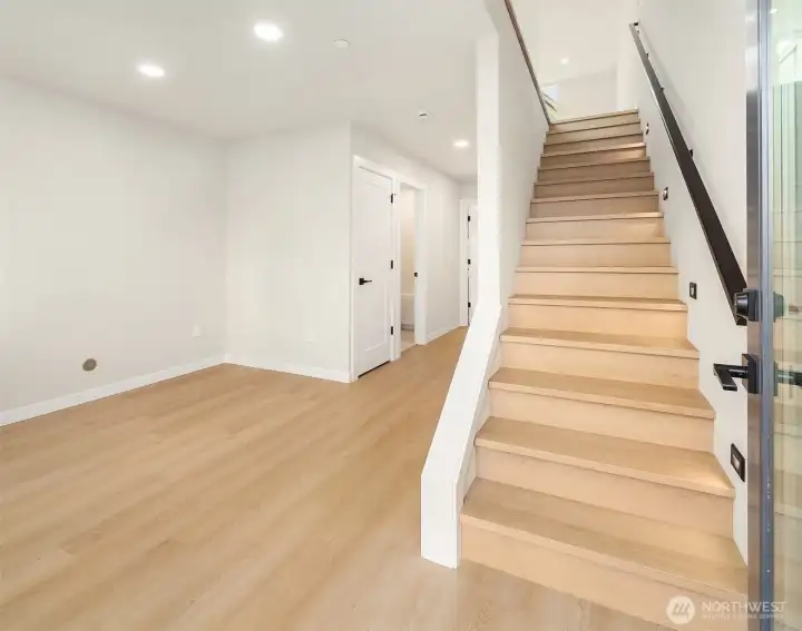 great entryway with plenty of room for coats, shoes, and storage