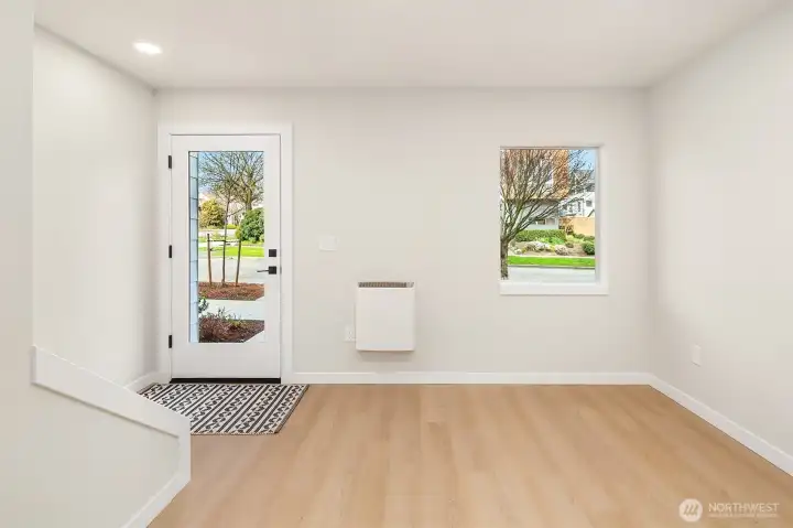 great entryway with plenty of room for coats, shoes, and storage