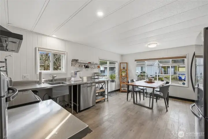 Sleek and Modern.  Seller preferred minimaliatic design, but plenty of room to add some cabinets if so desired,