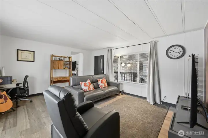 A view of the entry through the living room.