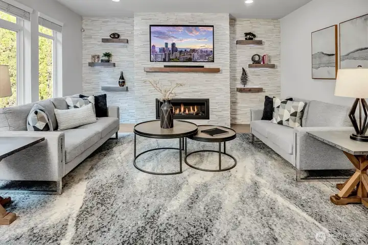 Gathering area with gas fireplace and under-shelf lighting