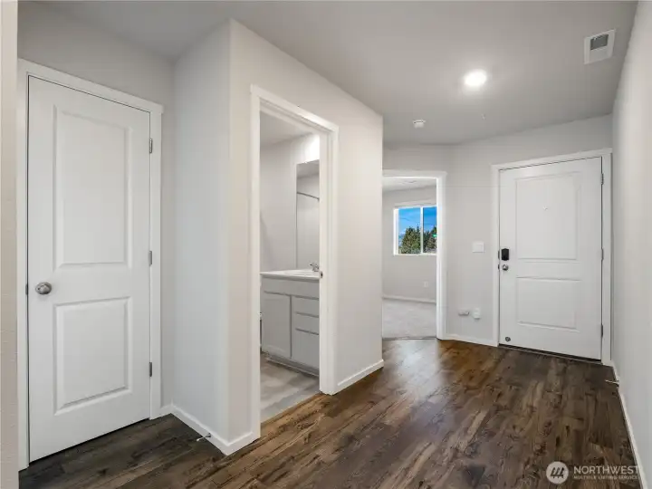Beautiful LVP flooring meets you at the front door and through the main portion of the home.