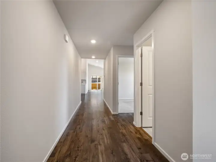 Entry hallway is wide leading to the two secondary bedrooms and full bathroom.