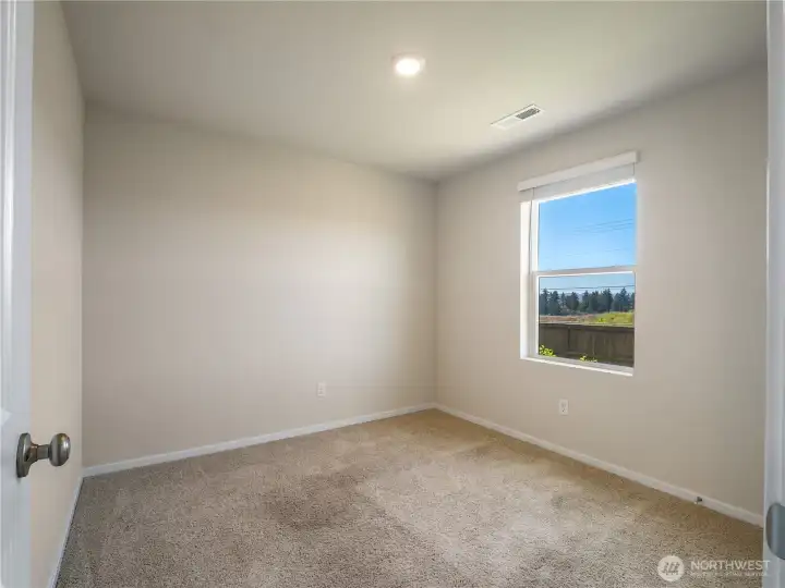 Bedroom number two is perfect for use as a private office or bedroom. It overlooks the backyard and currently has amazing Columbia River views.