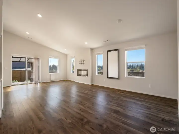Large windows and vaulted ceilings bring together the family room and dining room and opens to the kitchen. The west windows offer tremendous views of the beautiful Columbia River.