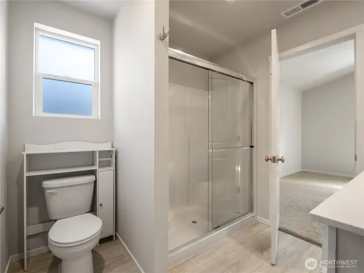 The en suite has a double size walk-in shower providing a spa-like experience.
