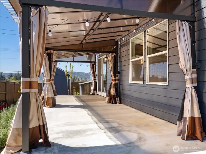 The expanded patio provides a great space to the outdoor living of this home.