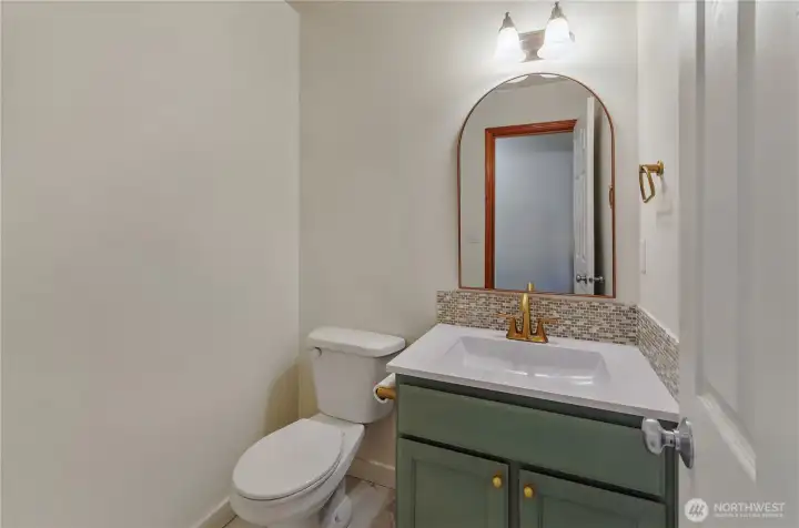 Completely remodeled half bath downstairs will impress your guests!