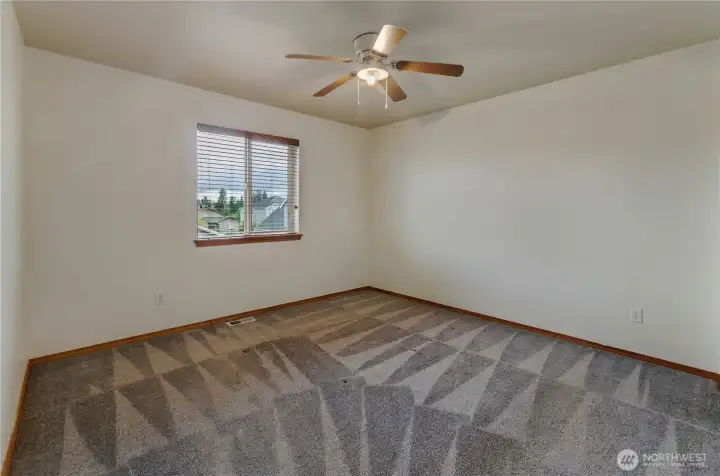 Wood slat blinds throughout the home