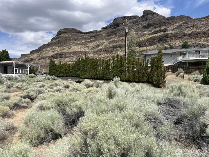 Looking up to the lot from the lower boundry line