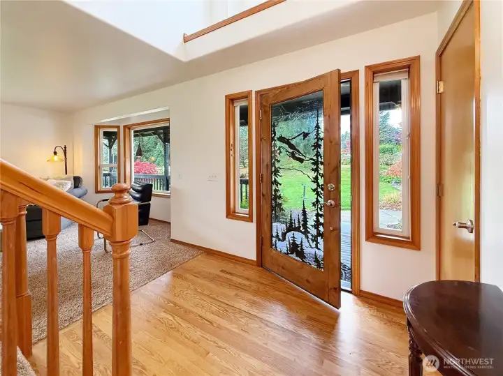 Spacious entry with beautiful front door & hardwoods