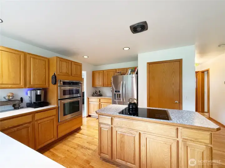 Kitchen with breakfast nook that is open into the family room