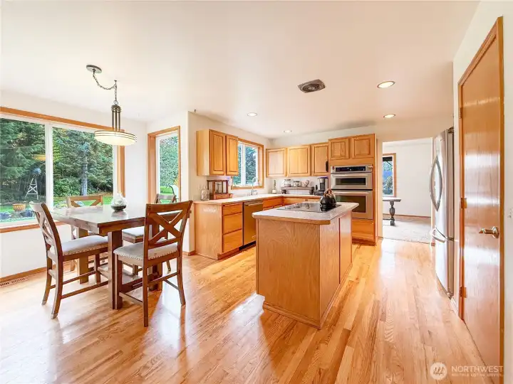 Kitchen with breakfast nook that is open into the family room