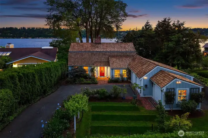 Romantic and stunning waterfront with oversized and sun-drenched lot.