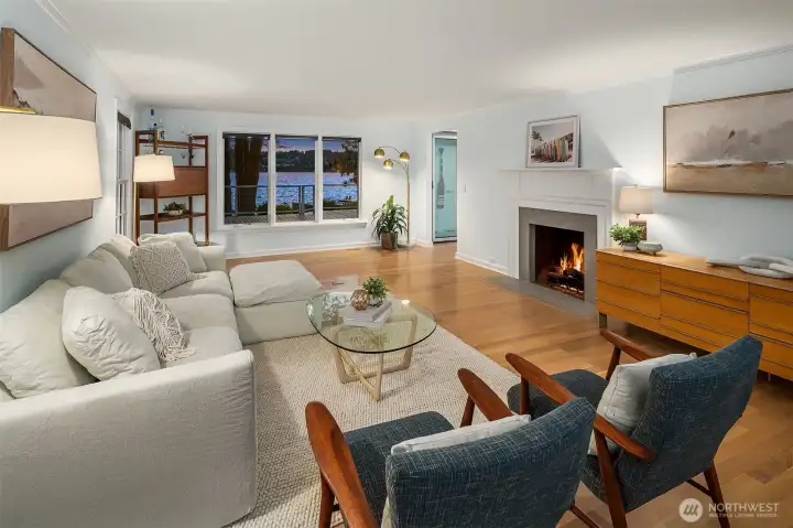 the formal living room with another fireplace.