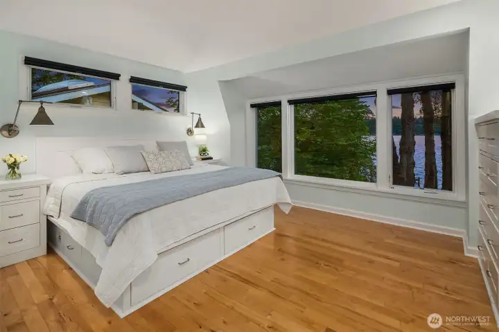 The primary suite with picturesque view.