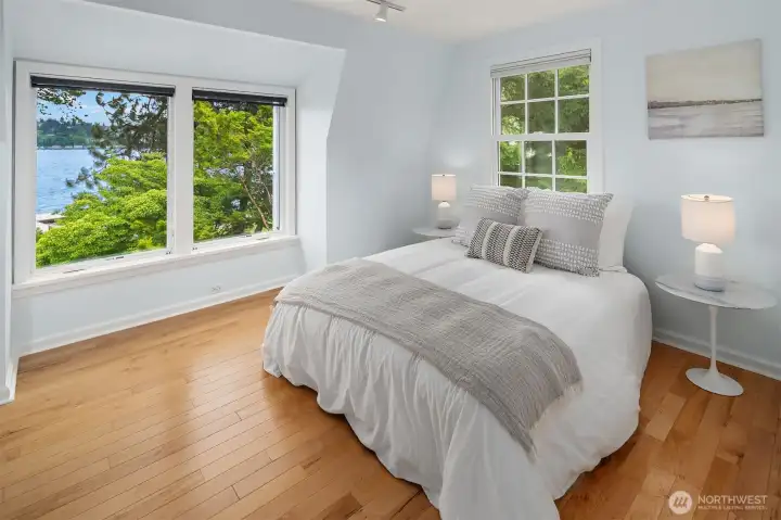 one of two additional bedrooms on the upper level.