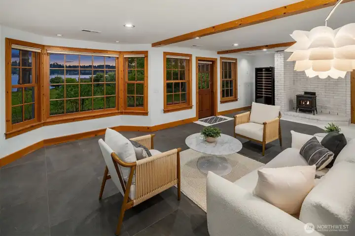 the lower level rec room was updated and has a wet bar. The wine rack stays!