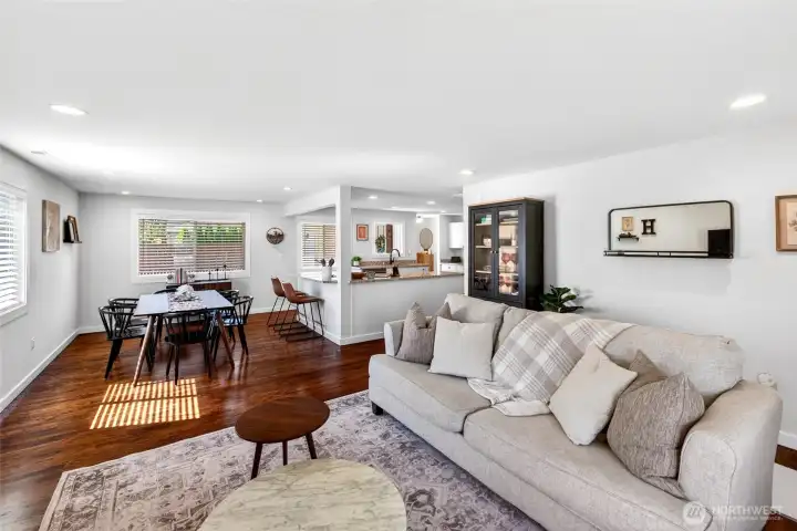 Front entry opens to living area and opens to dining & kitchen.