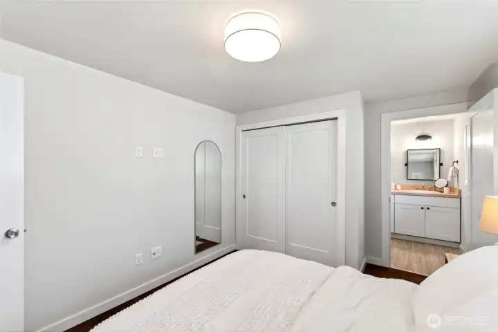 Primary bedroom with attached 3/4 bath.