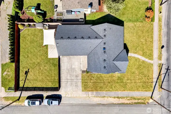Spacious corner lot with room to spread out & park your vehicles.