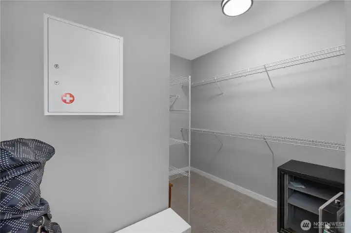 Organize with ease in the primary walk-in closet with plenty of hanging and shelf space.