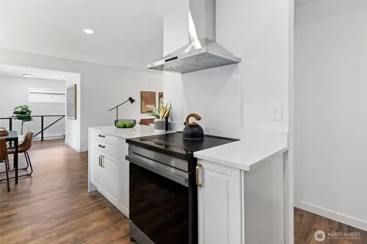 Fully remodeled kitchen with quartz counters, stainless steel wifi enabled appliances and curated designer details Fully remodeled kitchen with quartz counters, stainless steel wifi enabled appliances and curated designer details
