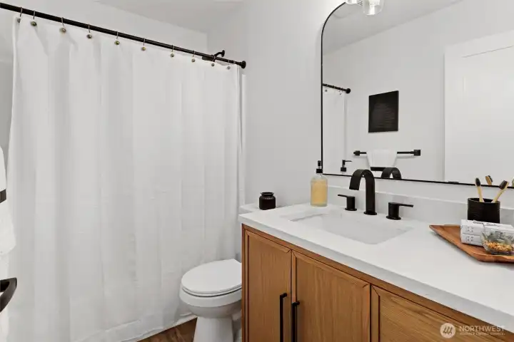 2nd Bathroom - full bathroom with new vanity, toilet, and refinished shower/tub 2nd Bathroom - full bathroom with new vanity, toilet, and refinished shower/tub